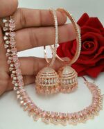 Beautiful Attractive Bali Jumki Earrings With Diamond Necklace Set Made Of Metal Like Brass And Copper Plated With Rose Gold. And with light pink Cubic Zirconia / American Diamond