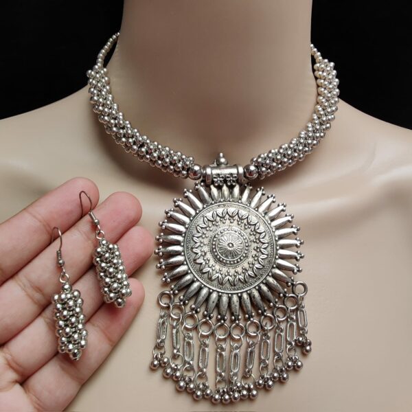 Beautifully Premium Quality Oxidised Silver Necklace With Earings, who is made Metal Alloy on which Plating Oxidised Silver .Artificial stones and pearls are used to make it more beautiful.
