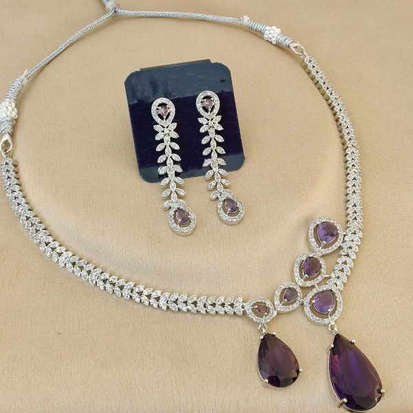 Premium quality Blackberry-coloured American diamond necklace and earrings made from metal alloy and copper with silver plating