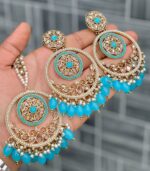 Beautiful premium quality reverse Ad Cyan blue coloured artificial stone, pearl earrings and tilak made of base metal alloy and gold plated and presented in hand holding