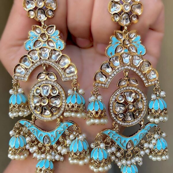 cool blue Mehendi Polish Pachi Kundan Long Earrings having base metal alloy and gold plated with artificial Kundan stones and pearls, adjustable and made in India. which is held in hands and presented