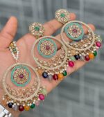 Beautiful premium quality reverse Ad multicolour coloured artificial stone, pearl earrings and tilak made of base metal alloy and gold plated and presented in hand holding