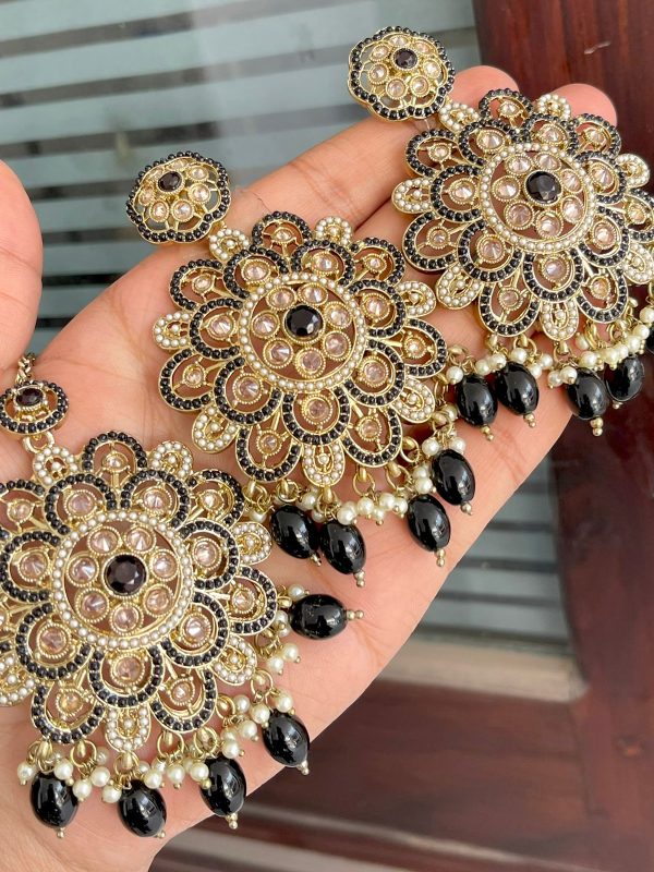 Beautiful premium quality Pakistani add stone work Black earrings, maang tikka with base metal alloy, and plating gold with artificial stones, pearls, and Kundan.