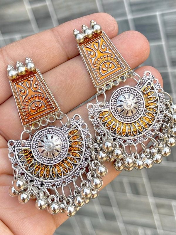 The beautiful lightweight Rose gold coloured oxidized silver earrings whose base metal is oxidized silver and plating is also made of silver and the beads are also made of silver.